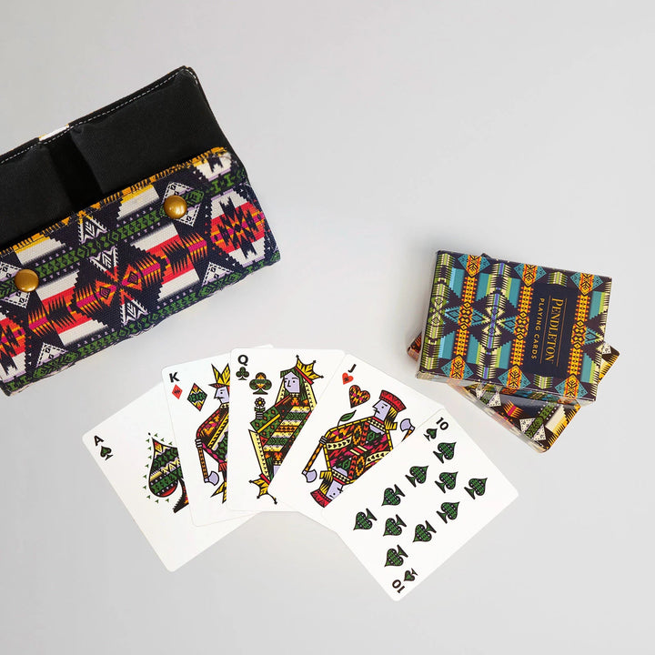 Playing cards with a unique design on a gray surface